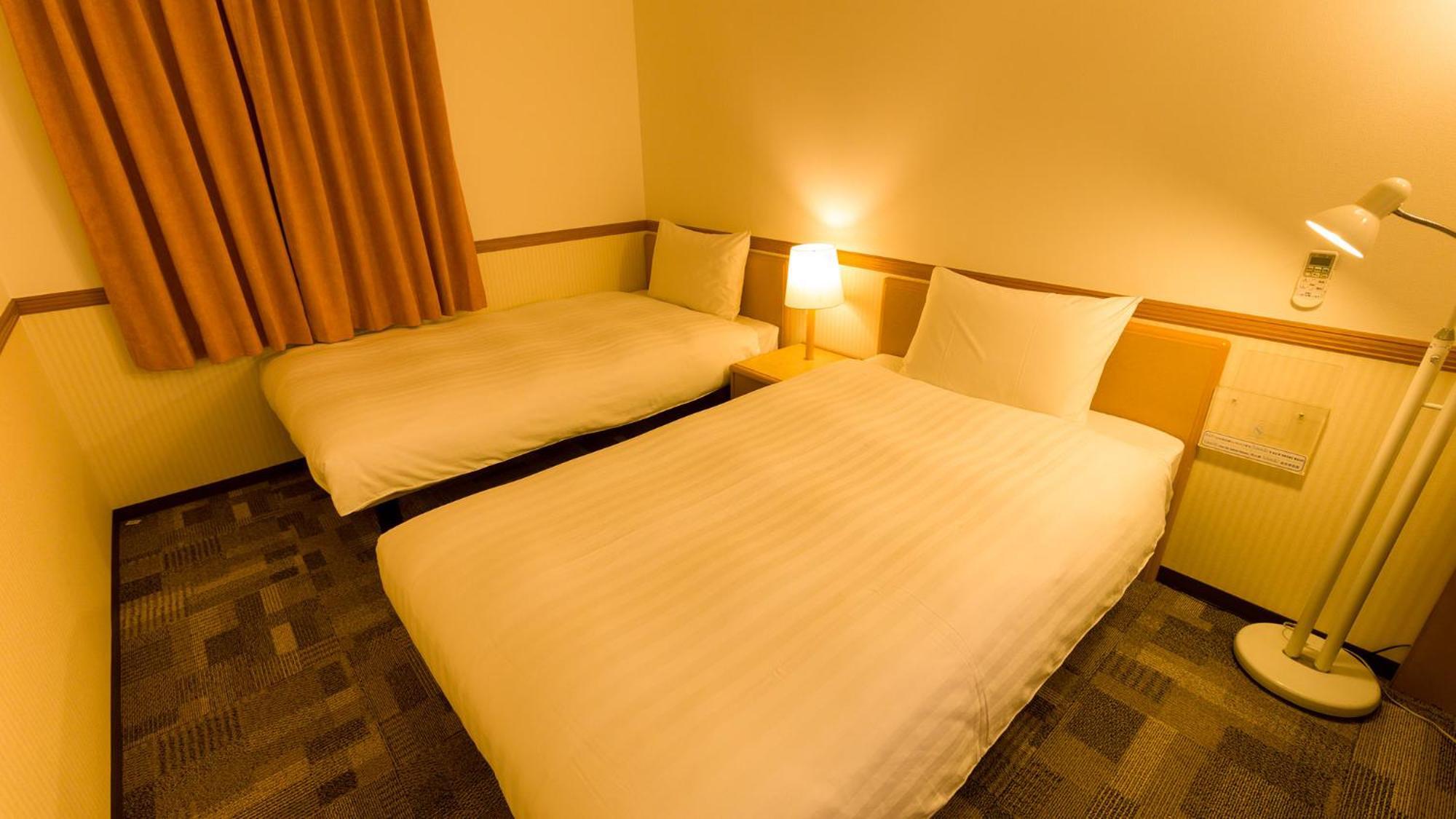 Toyoko Inn Kokura-Eki Minami-Guchi Kitakjusu Szoba fotó
