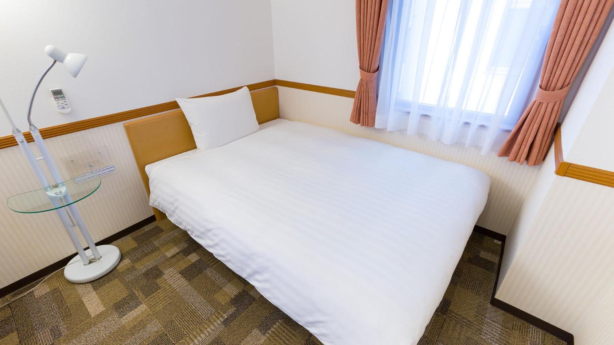 Toyoko Inn Kokura-Eki Minami-Guchi Kitakjusu Szoba fotó