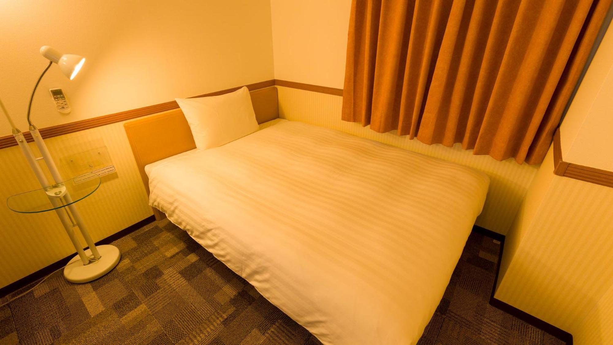 Toyoko Inn Kokura-Eki Minami-Guchi Kitakjusu Szoba fotó